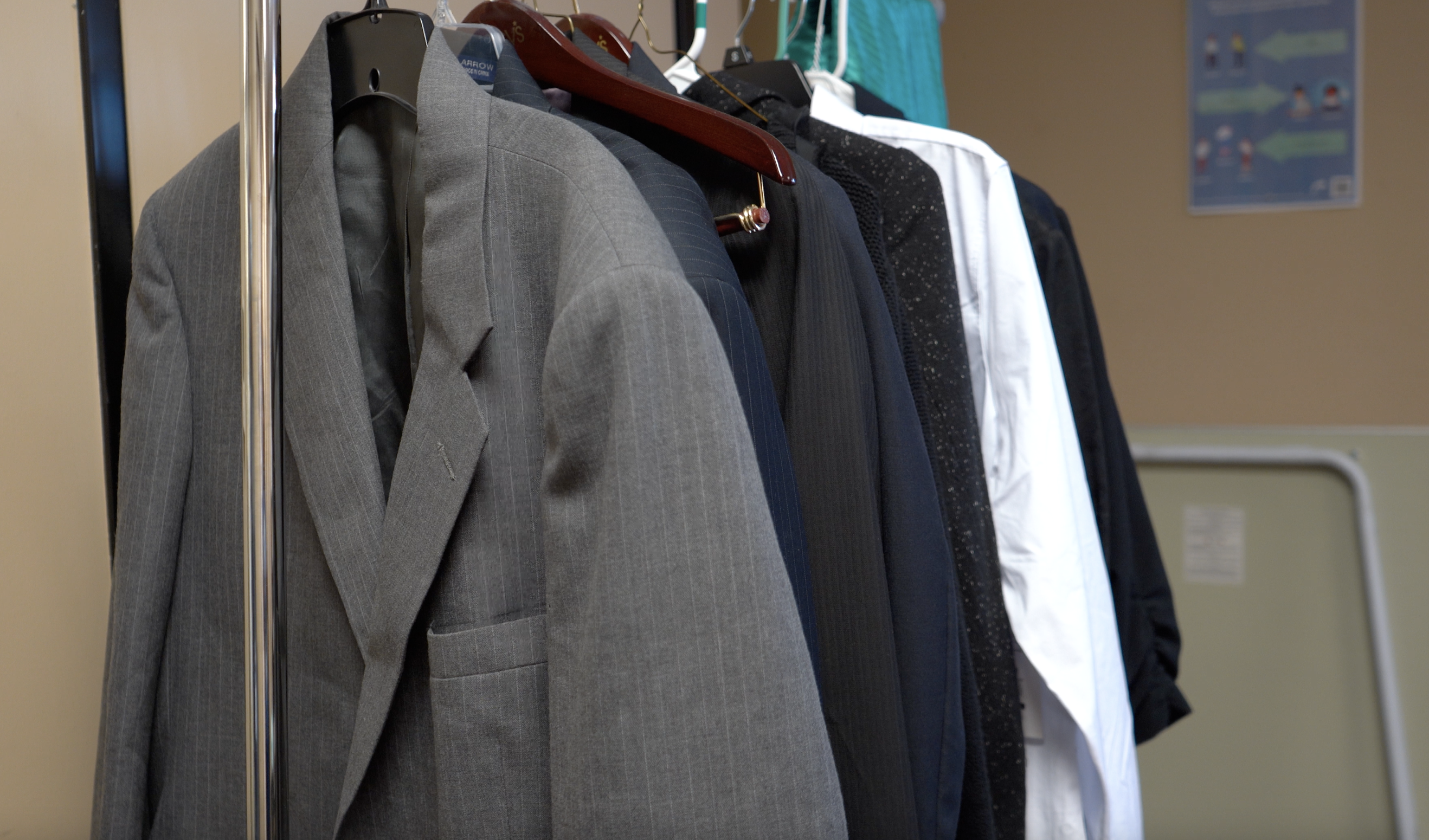 Image of donated professional clothes from UMOM's clothing closet.